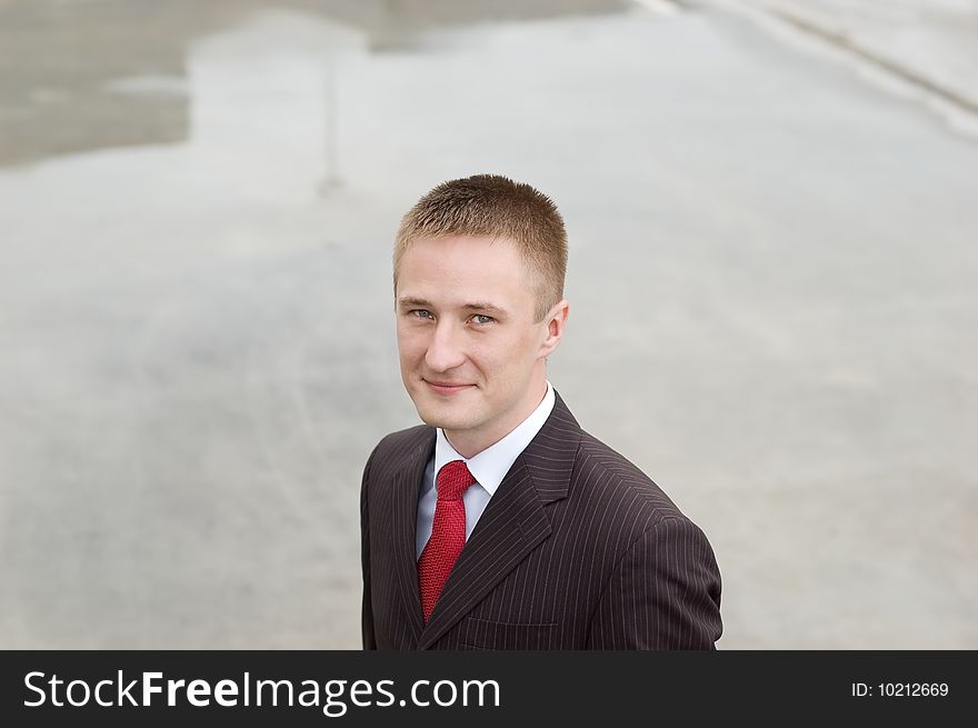 Portrait of a young businessman outdoor the office