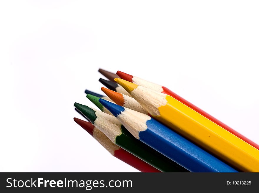 Bunch of colorful pencils against a white background