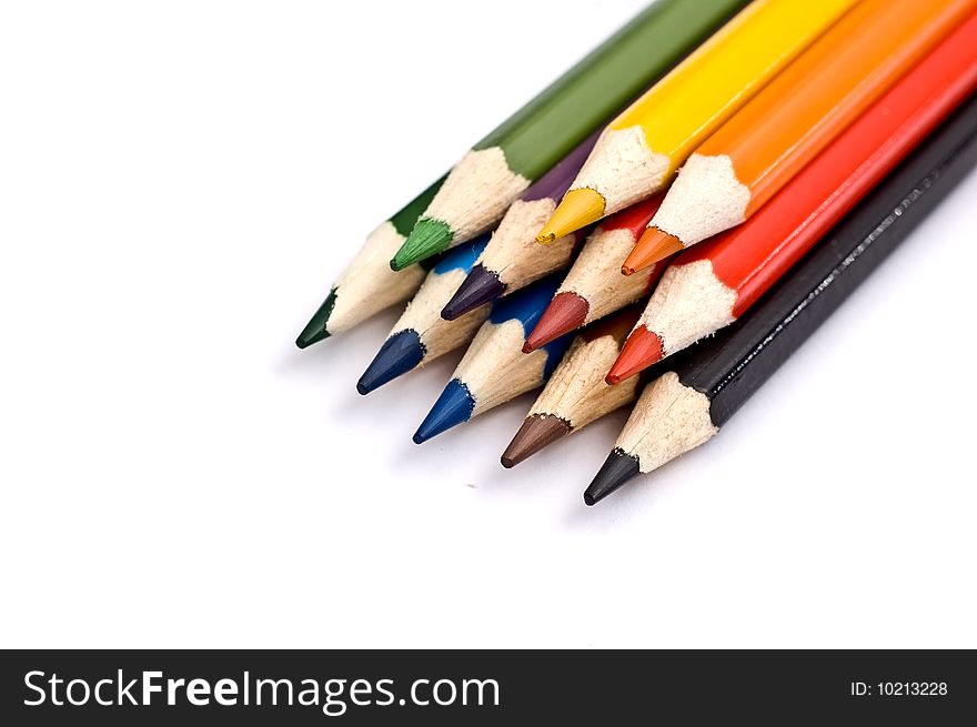 Bunch of colorful pencils against a white background