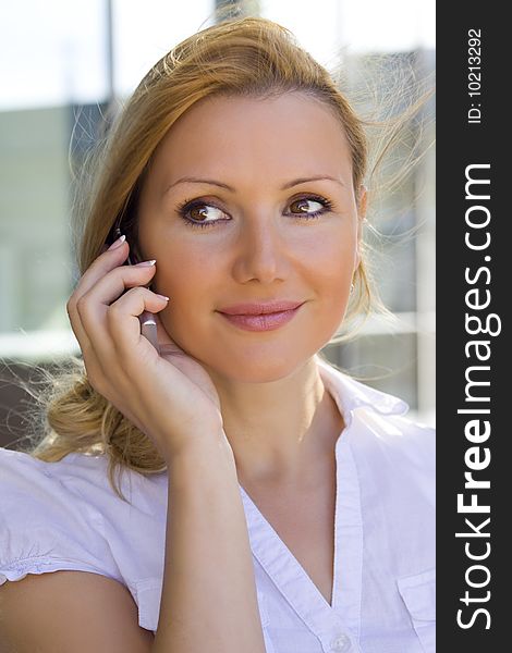 Beautiful young woman on the phone