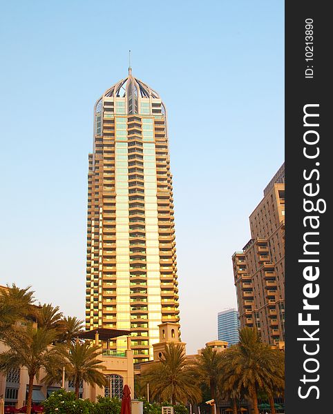 Sun setting on a luxury highrise building in Dubai. Sun setting on a luxury highrise building in Dubai
