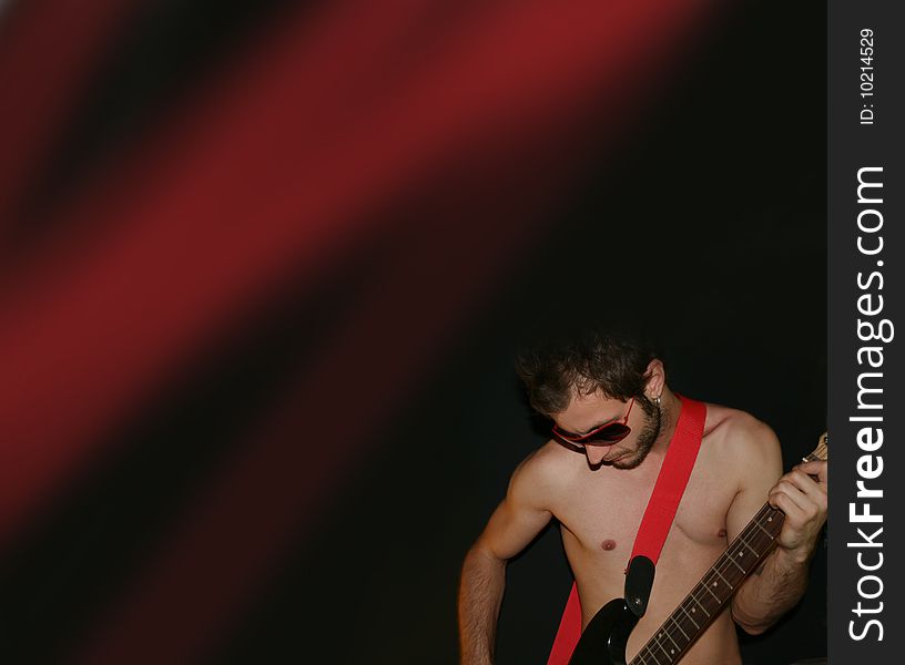 Isolated red electric guitar shot over white background