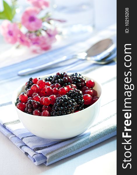 Dessert with redcurrants and blackberries