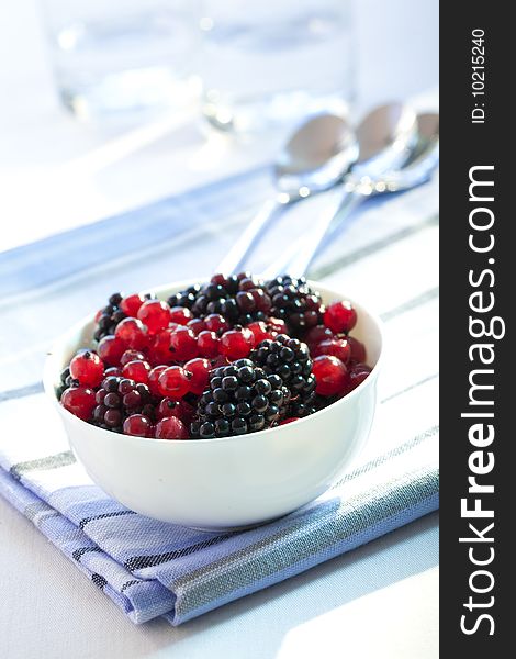 Dessert with redcurrants and blackberries