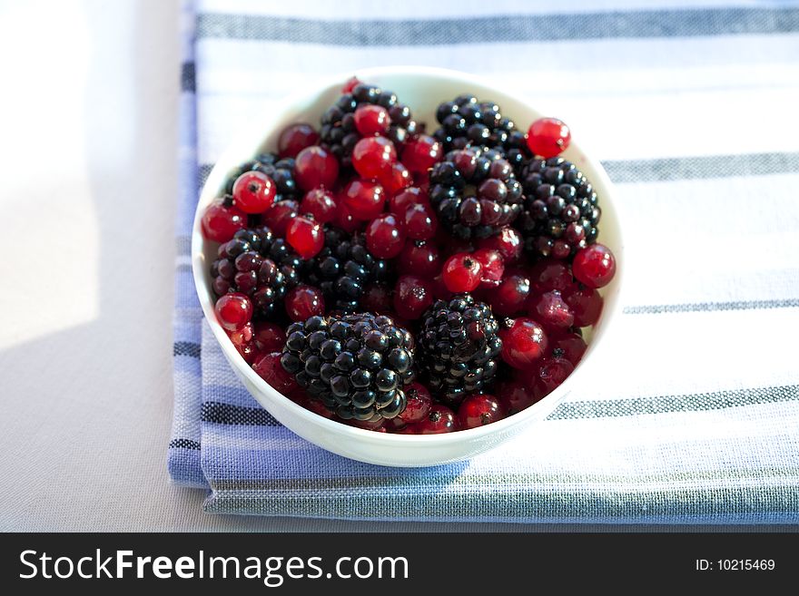 Dessert with redcurrants and blackberries