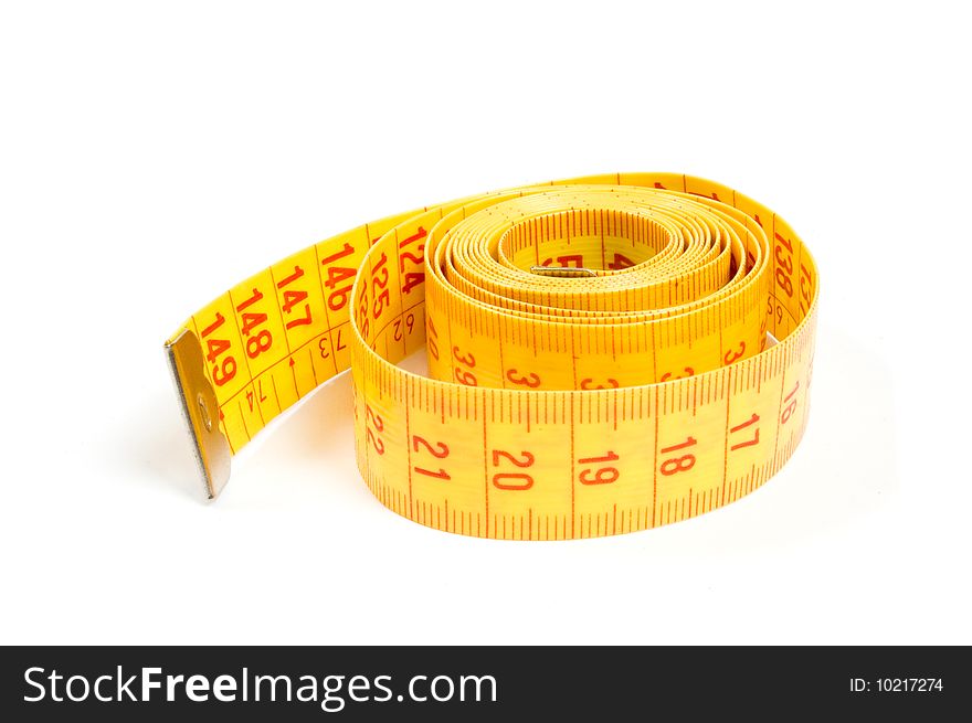 Curled yellow measuring tape on white background