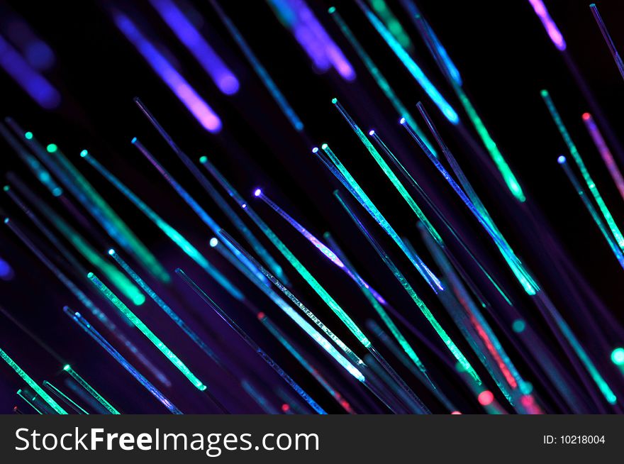 Close-up of illuminated optical fibers. Close-up of illuminated optical fibers