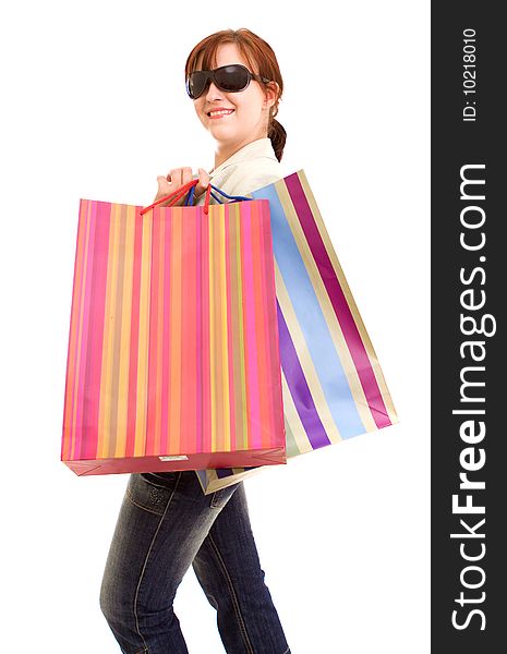 Young brunette woman with shopping bags. Young brunette woman with shopping bags