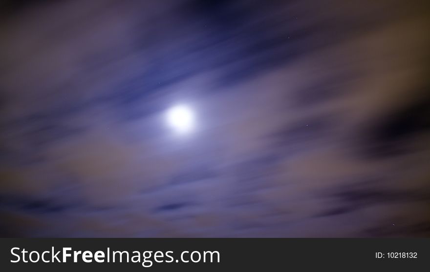 Clouds and moon at night