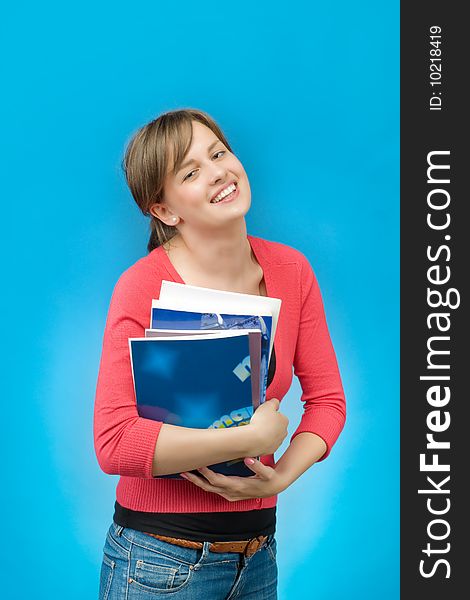 Beautiful smiling woman with books. Beautiful smiling woman with books