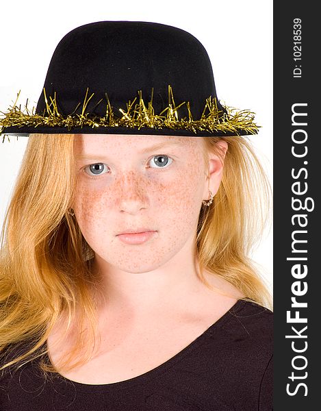 Girl is wearing a black hat with golden streamer isolated on white