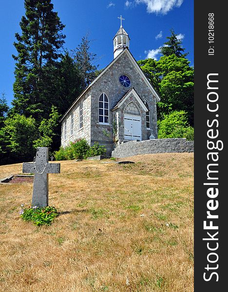 An old stone church sits on a hill on Saltspring Island, Canada. An old stone church sits on a hill on Saltspring Island, Canada
