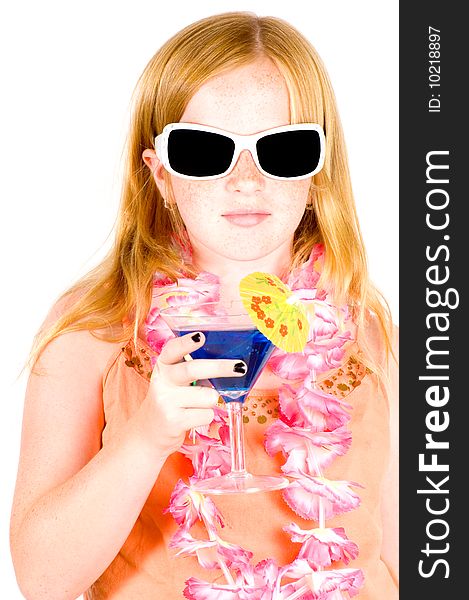 Girl is drinking a blue cocktail wearing sunglasses isolated on white