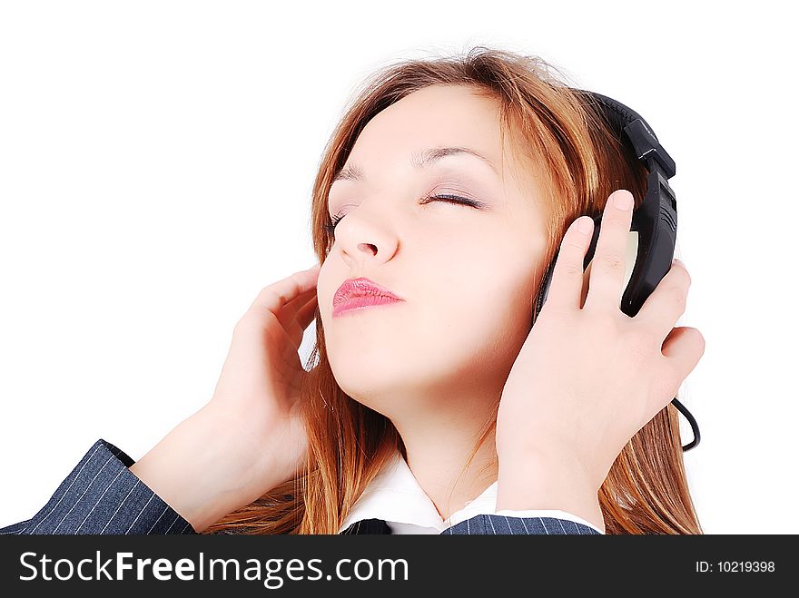 girl is listening to music with her head up. girl is listening to music with her head up