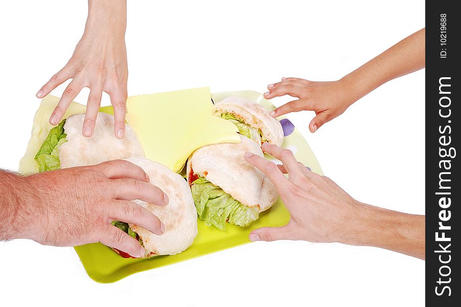 Four hands about take a sandwich