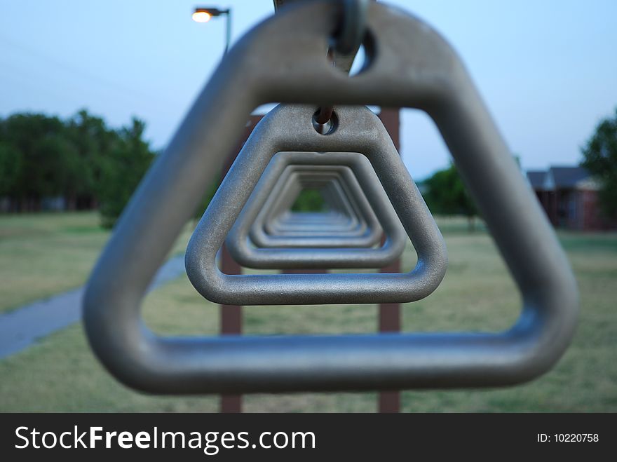 Monkey Rings along a running trail in Altus, OK; a challenge for five year olds, and nearly impossible after 40. Monkey Rings along a running trail in Altus, OK; a challenge for five year olds, and nearly impossible after 40.