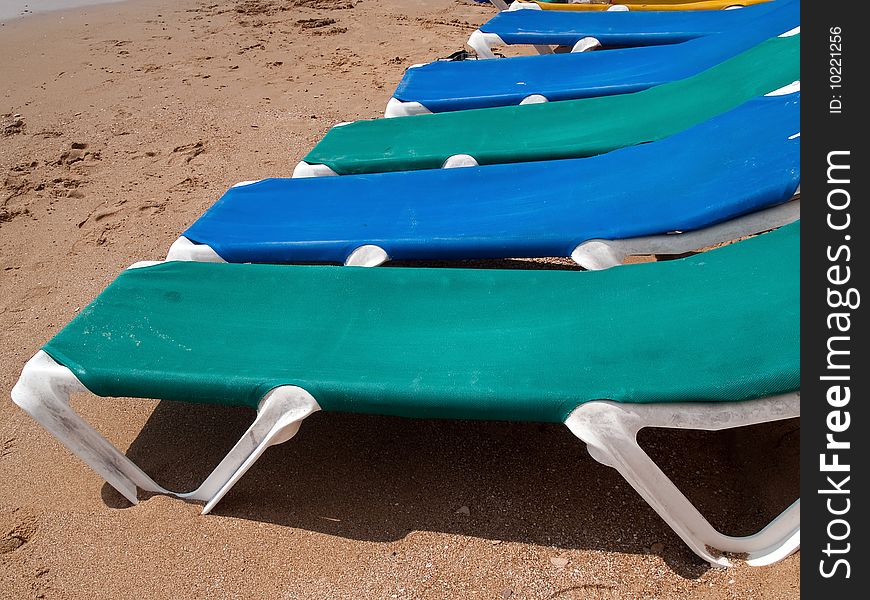 Summer Vacation Beach Line of sun beds