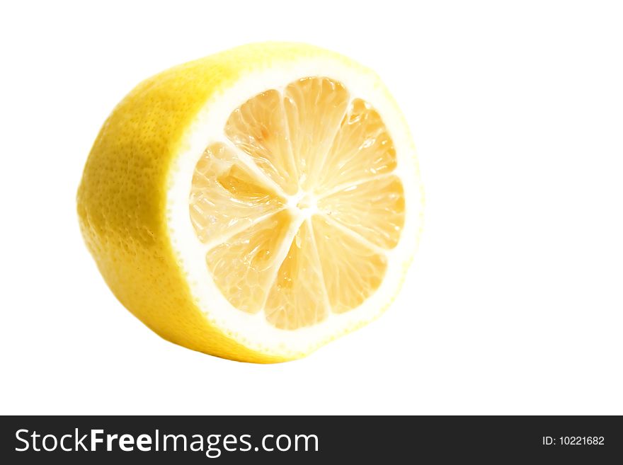 Yellow lemon on the white