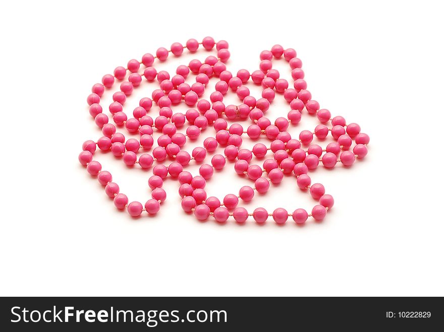 Pink necklace isolated on white