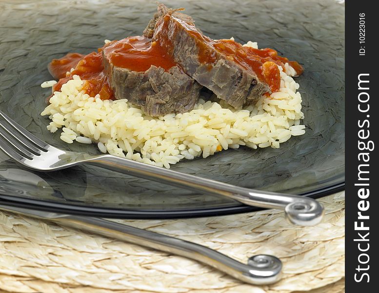 Beef meat with tomato sauce