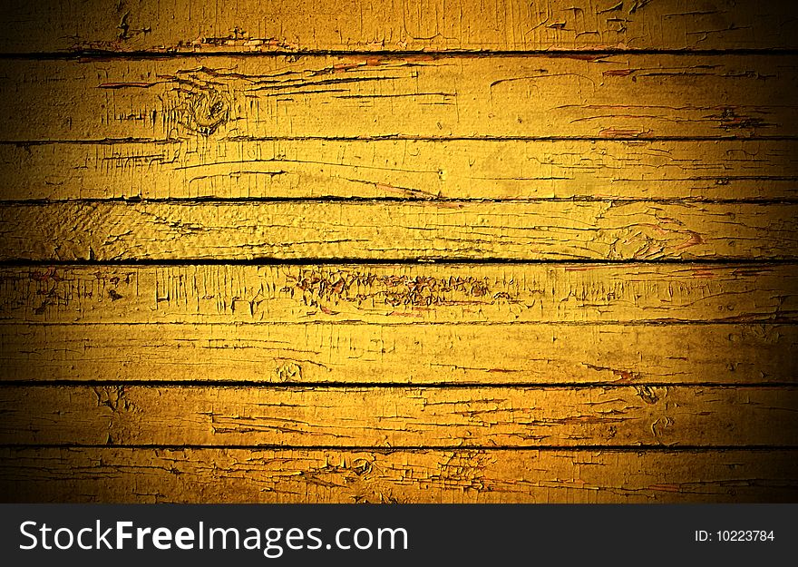 Grunge background from weathered yellow wooden plank. Grunge background from weathered yellow wooden plank