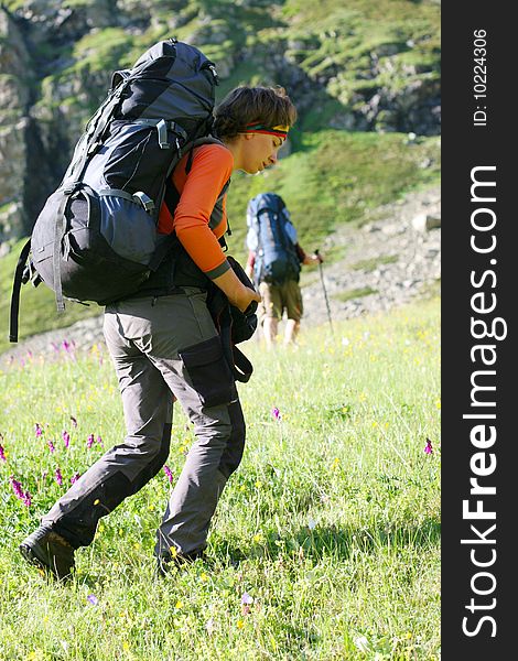 Hiker girl in Caucasus mountains