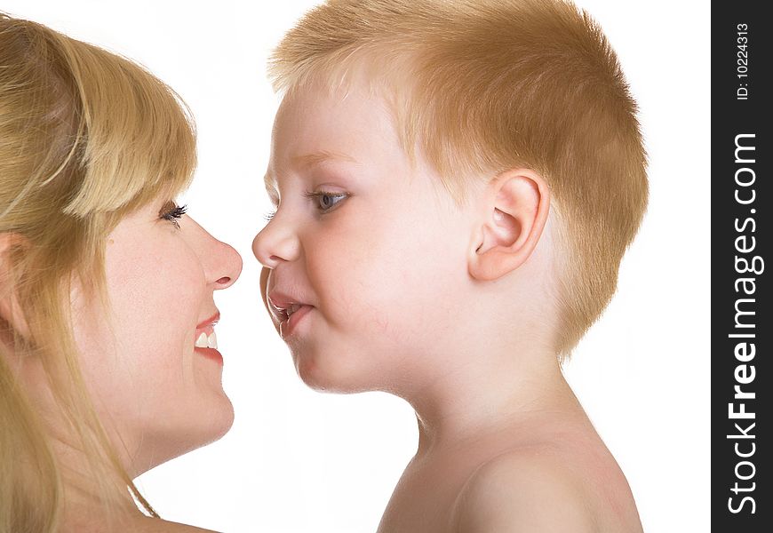 Young mum with the small son on a white background. Young mum with the small son on a white background