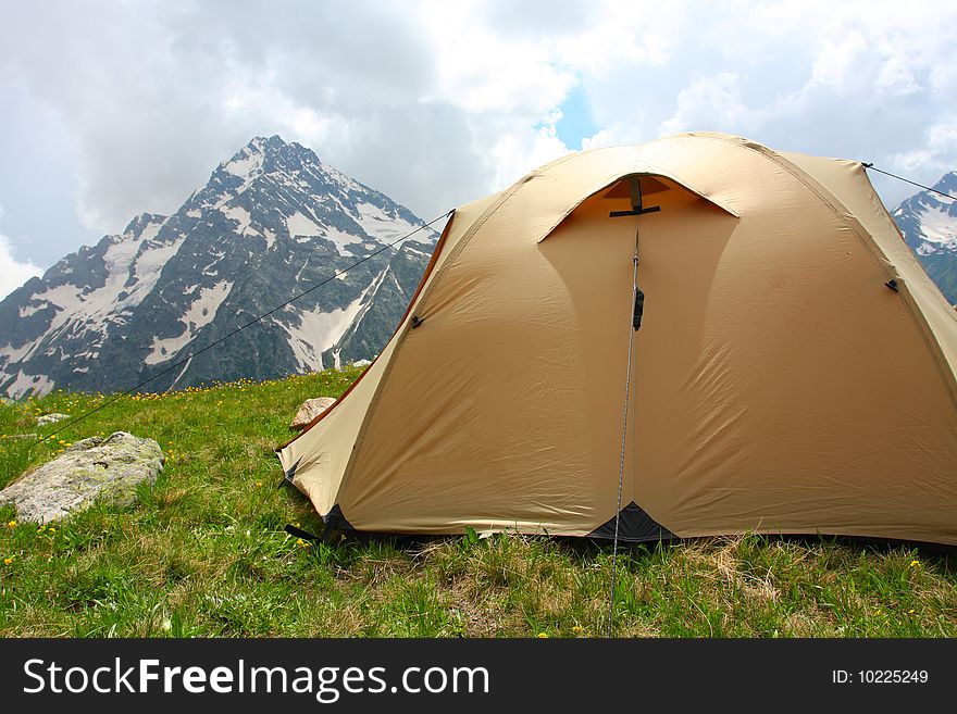 Yelow tent in Caucasus mountain