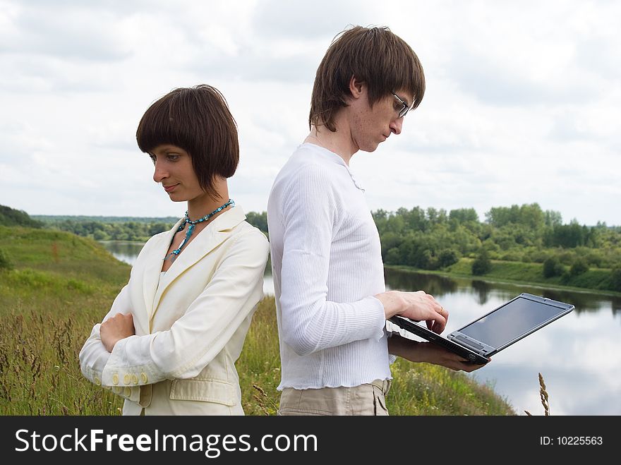 The man and women with laptop