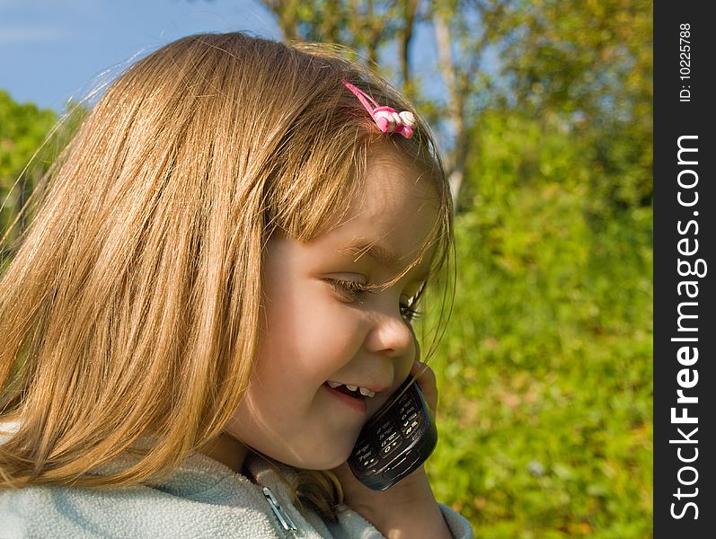 Little Girl With Phone