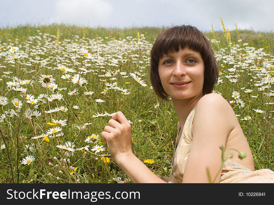 The portrait  of girl in the middle of flower (bank of river)