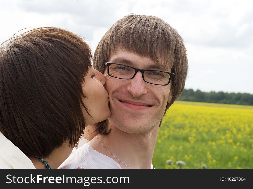 Boy and girl on a green grass. Boy and girl on a green grass