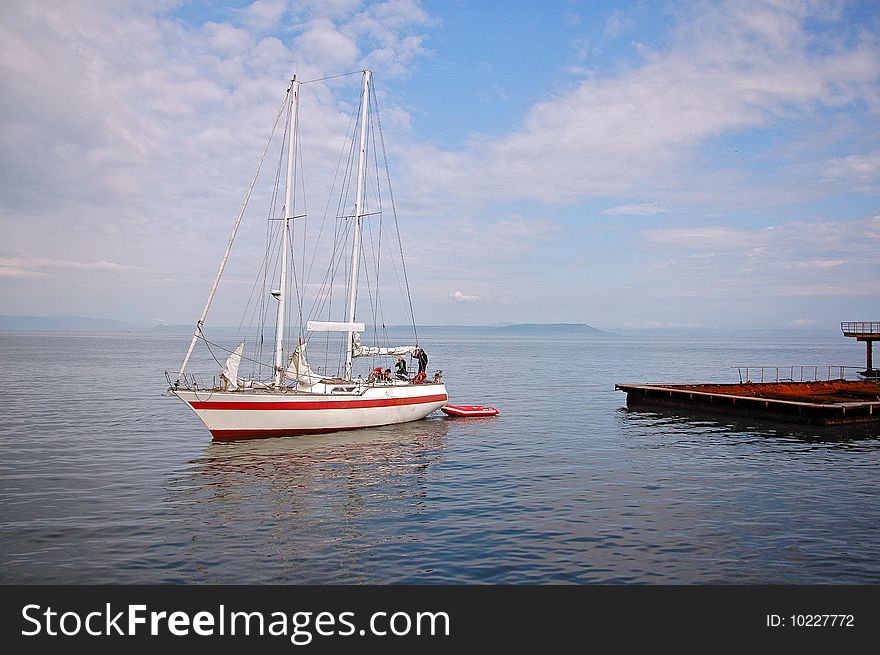 The yacht in the see bay. The yacht in the see bay