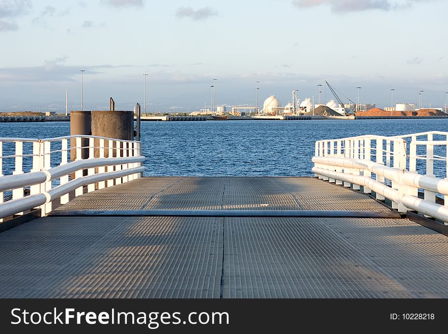 A ferry boat entrance with some industry at the other side. A ferry boat entrance with some industry at the other side.