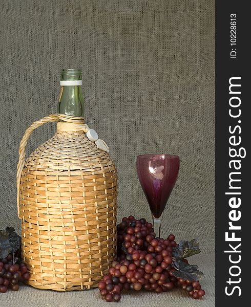 Wine Bottle with Grapes and Glass Still-life