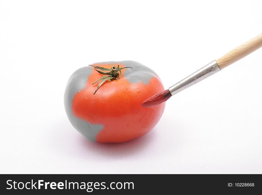 Coloring the tomato by brush. Coloring the tomato by brush