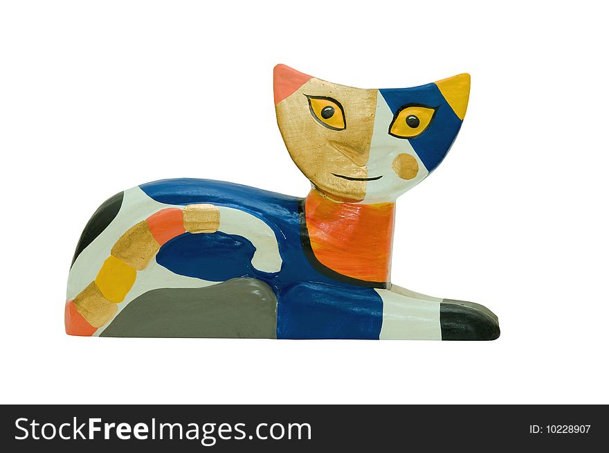 Photo of wooden cat figurine isolated over white background
