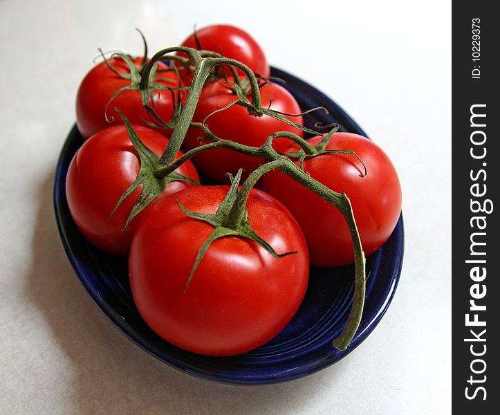 Ripe Red Oregon Hot house Tomatos. Ripe Red Oregon Hot house Tomatos