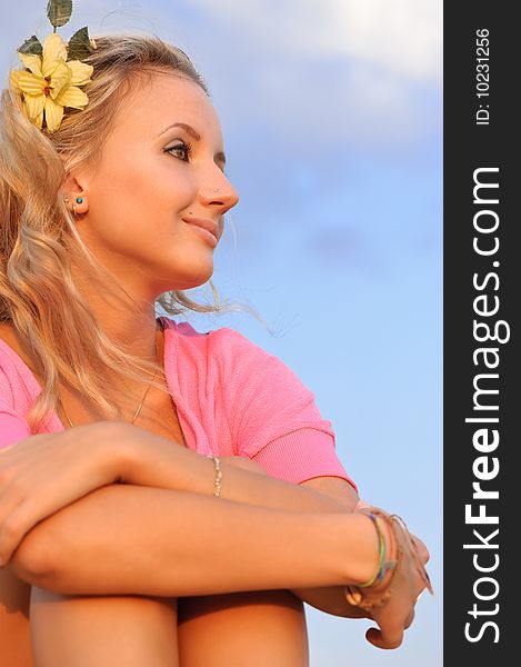 Portrait of pretty blond girl in light of sunset. Portrait of pretty blond girl in light of sunset