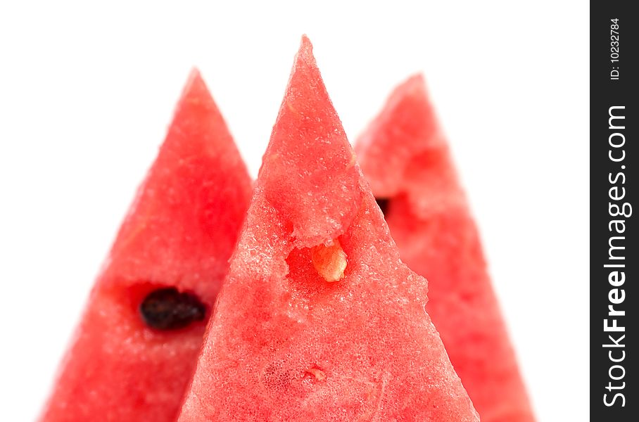Fresh slices of watermelon on a white background