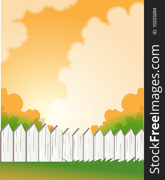 White fence with green lawn under dusk