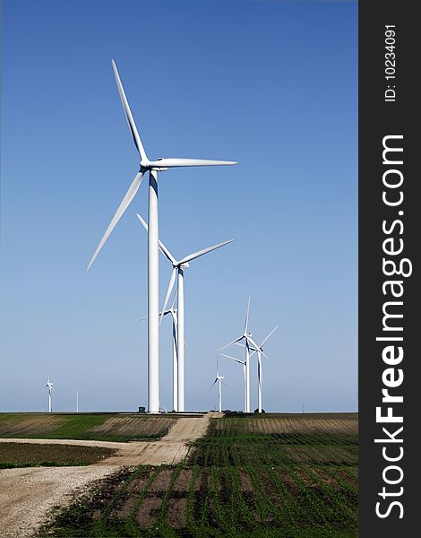 Wind farm on a dirt road. Wind farm on a dirt road