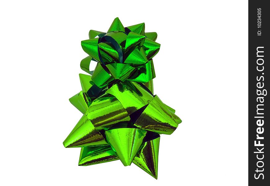 This is an isolated green gift bow used on parcels, gifts or packages for birthdays, christmas and other such celebrations. This is an isolated green gift bow used on parcels, gifts or packages for birthdays, christmas and other such celebrations.