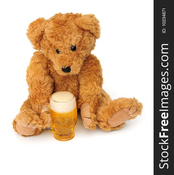 A bear about to enjoy a pint of beer. A bear about to enjoy a pint of beer