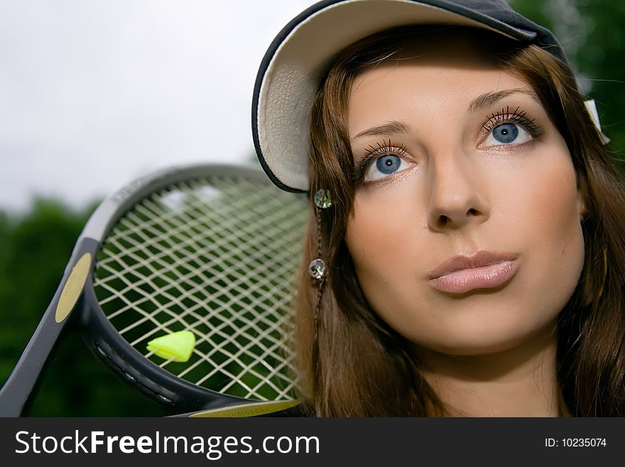 Pretty playing tennis young woman. Pretty playing tennis young woman