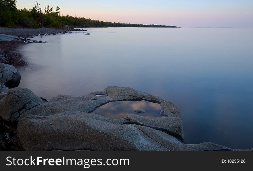 Bowl of clouds in a stone on the North Shore of Lake Superior at Stoney Point in Minnesota