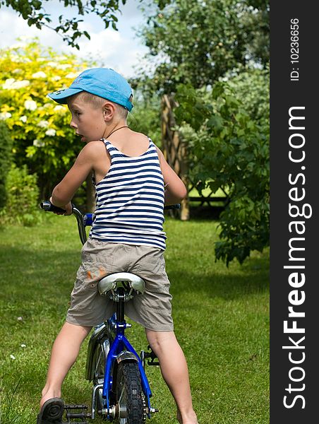 The child of outdoor goes for a drive on bicycle. The child of outdoor goes for a drive on bicycle