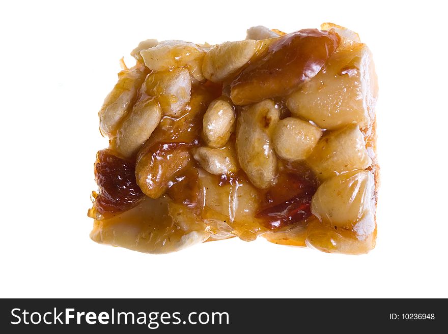 Peanut with honey isolated on white