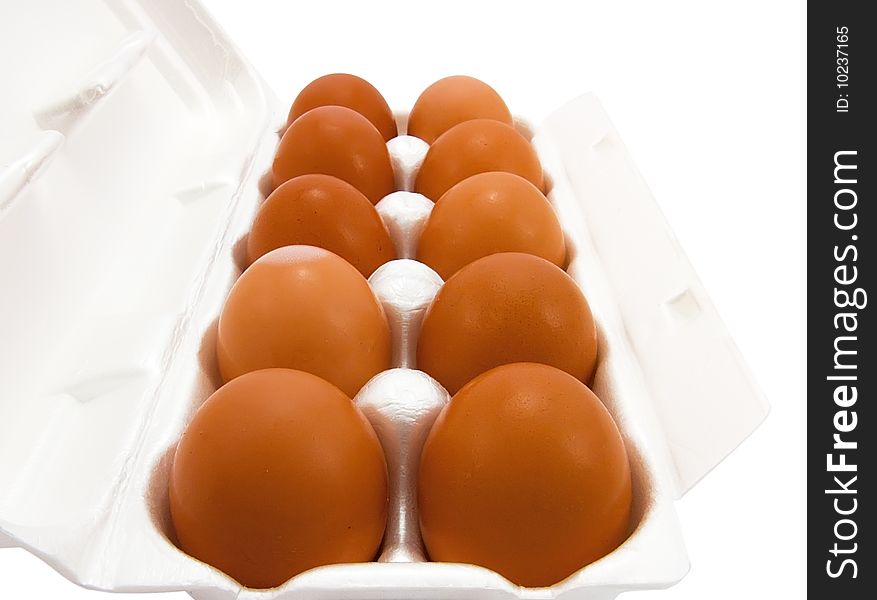 Container of eggs on a white background