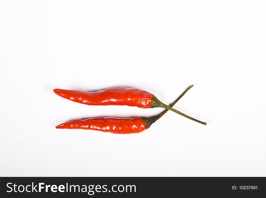 Red hot chili pepper on the white background